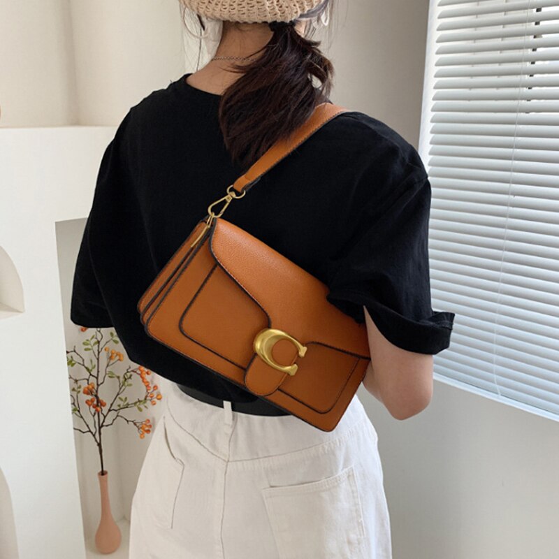 Luxury Vegan Leather Handbag with Gold and Brown Details