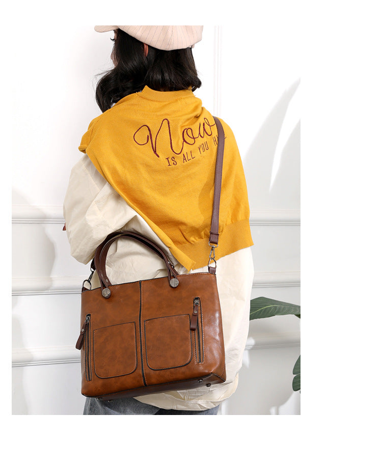 Vintage Leather Style Shoulder Bag for Women with Adjustable Strap and Spacious Design